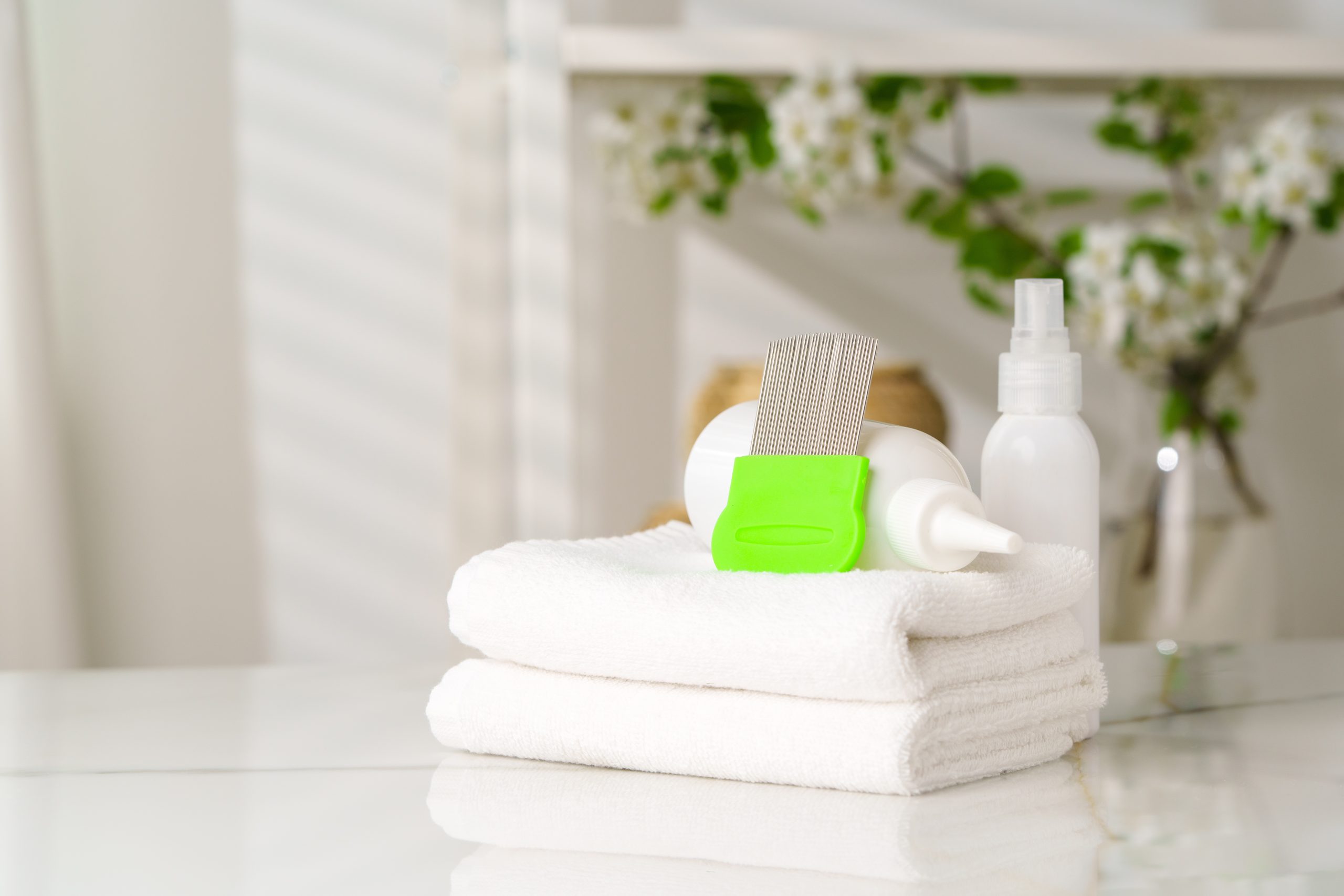 Lice treatment product bottles and comb for a prevention products article